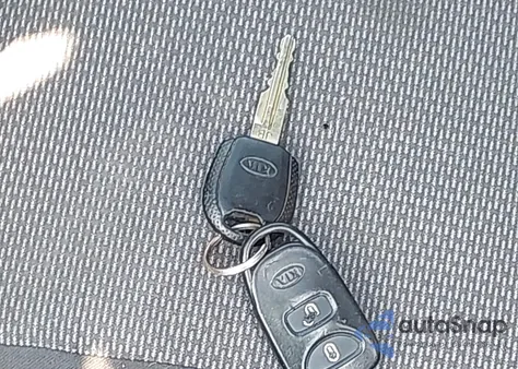 2009 Kia Rio Lx from USA, damaged, VIN KNADE223296448785